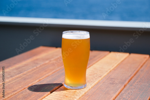 Summer time light beer by the coast