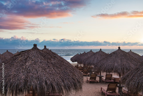 Beach Palapas Ocean with Sunset