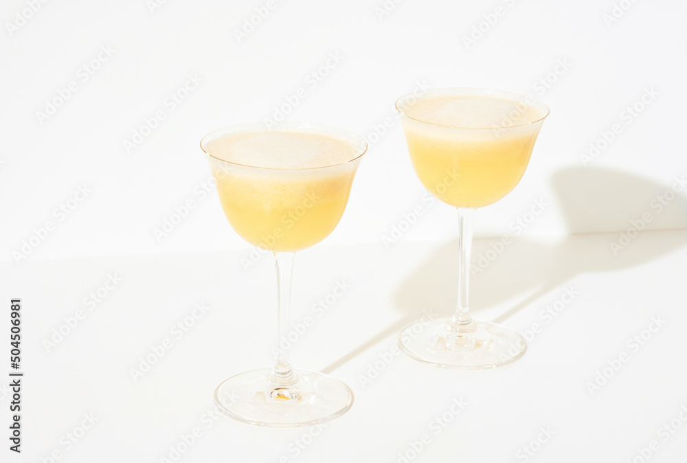 Two Banana Daiquiri Cocktails on White Two Banana Daiquiri Cocktails on White