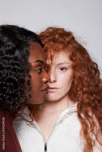 Close Up Profiles Of Two Beautiful Girls 