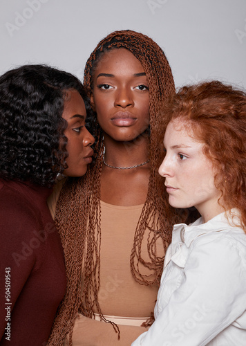 Close Up Profiles Of three women photo