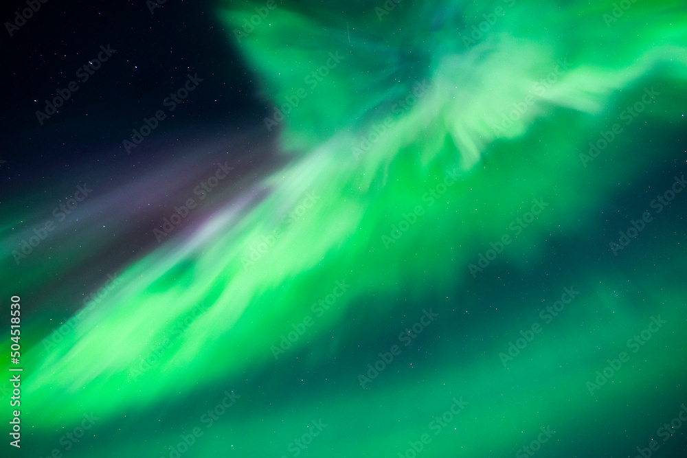Northern Lights Creates a Display of Light and Color On the Starry Sky ...