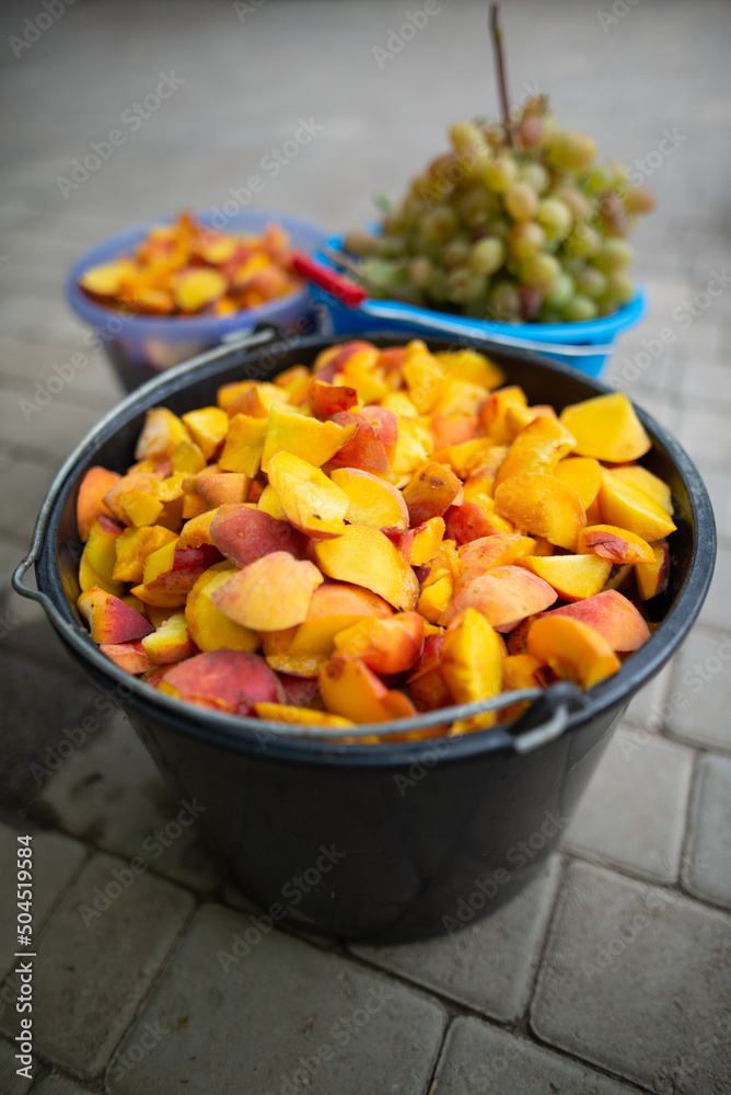Sliced ripe peaches and grapes Sliced ripe peaches and grapes