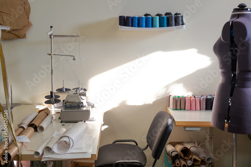 workplace of a seamstress in a dress atelier 