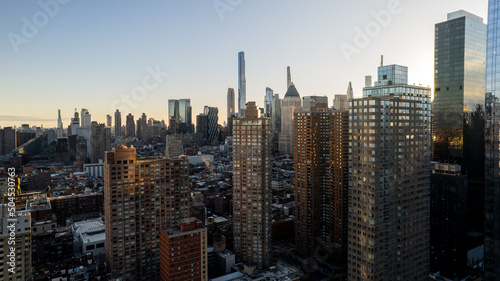 aerial view of Modern skyscrapers in megapolis of  Manhattan at sunset photo