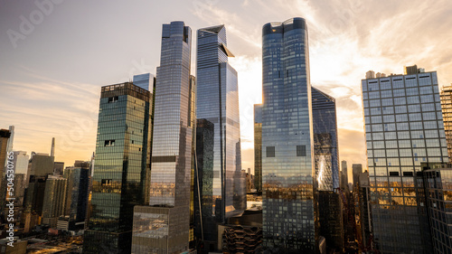 Modern skyscrapers in megapolis of lower Manhattan at sunset 