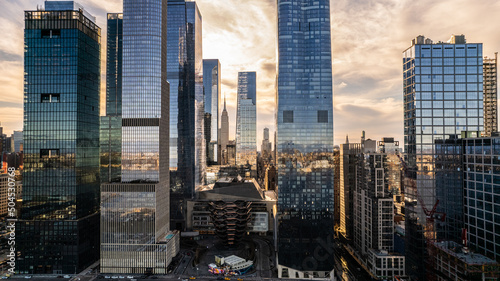 Modern skyscrapers in megapolis of lower Manhattan at sunset   photo