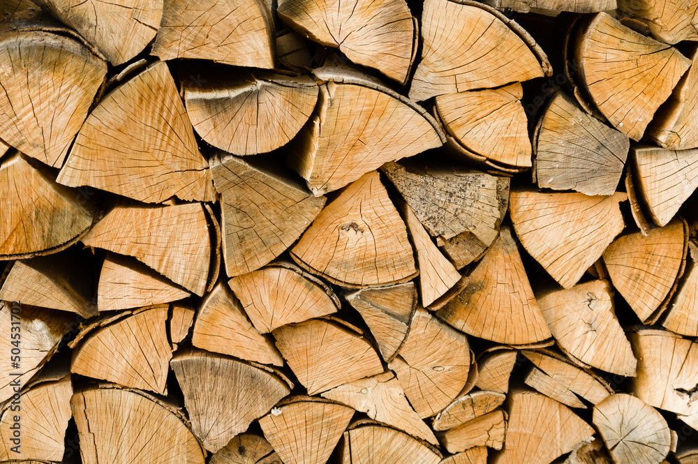 Neatly arranged stockpile of wood for winter Neatly arranged stockpile of wood for winter