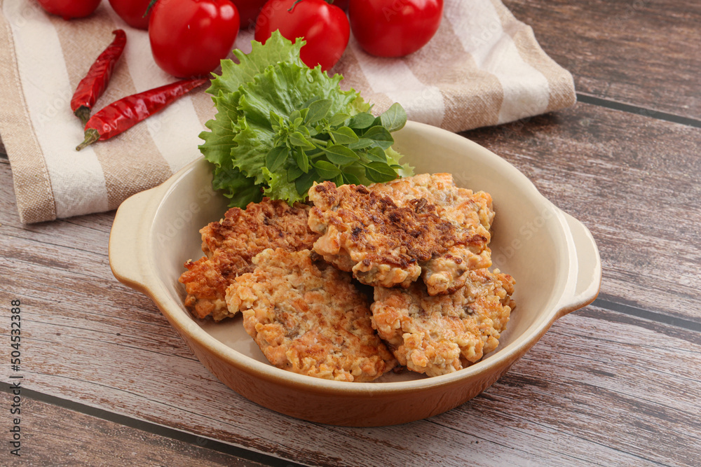 Fried salmonn cutlet in the bowl Fried salmonn cutlet in the bowl