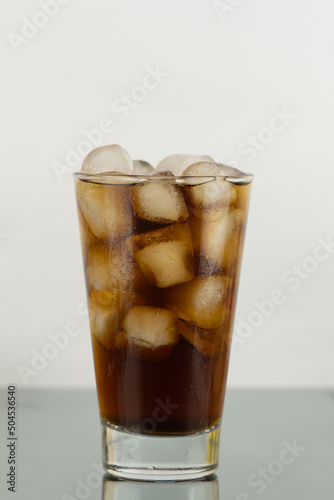 A glass of coke with ice