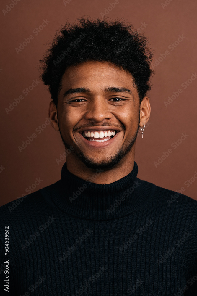 Merry black man in turtleneck Merry black man in turtleneck