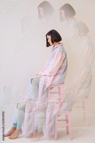 Surreal fashion portrait in pastel colors photo