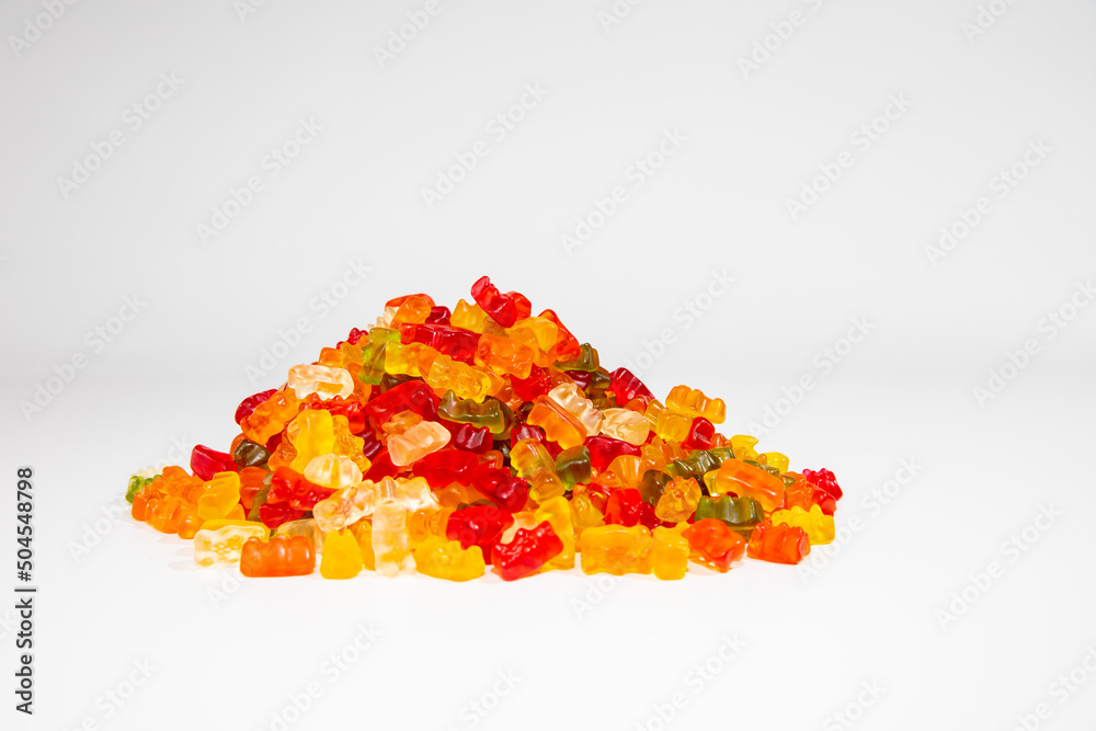 Delicious Pile of Colorful Gummy Bears Candy on White Background Delicious Pile of Colorful Gummy Bears Candy on White Background