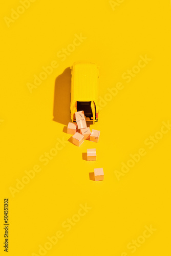 Yellow post vehicle delivering goods