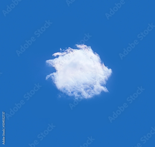 Single cloud isolated over deep blue sky background photo