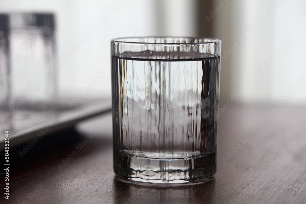 Closeup transparent crystal glass cup Stock Photo | Adobe Stock