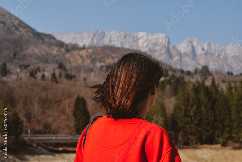 Anonymous woman in red sweatshot outdoor photo