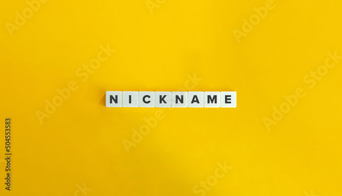Nickname Word and Banner. Letter Tiles on Yellow Background. Minimal Aesthetics. photo