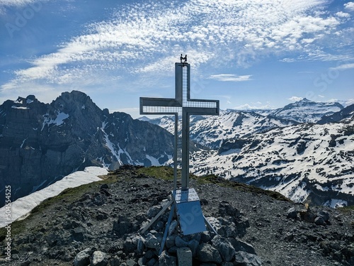 Obraz na plátně summit cross on the fronalstock in the canton of glarus