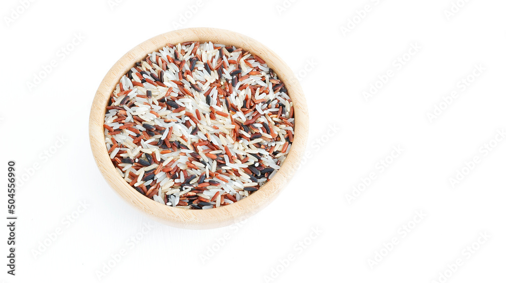 Group of mixs grains raw red, white, black and brown rice in a wooden bowl isolated on white background, dry seeds peeled, asian healthy food eating Group of mixs grains raw red, white, black and brown rice in a wooden bowl isolated on white background, dry seeds peeled, asian healthy food eating