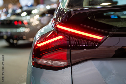 closeup of a red led taillight on a modern car  detail on the rear light of a car