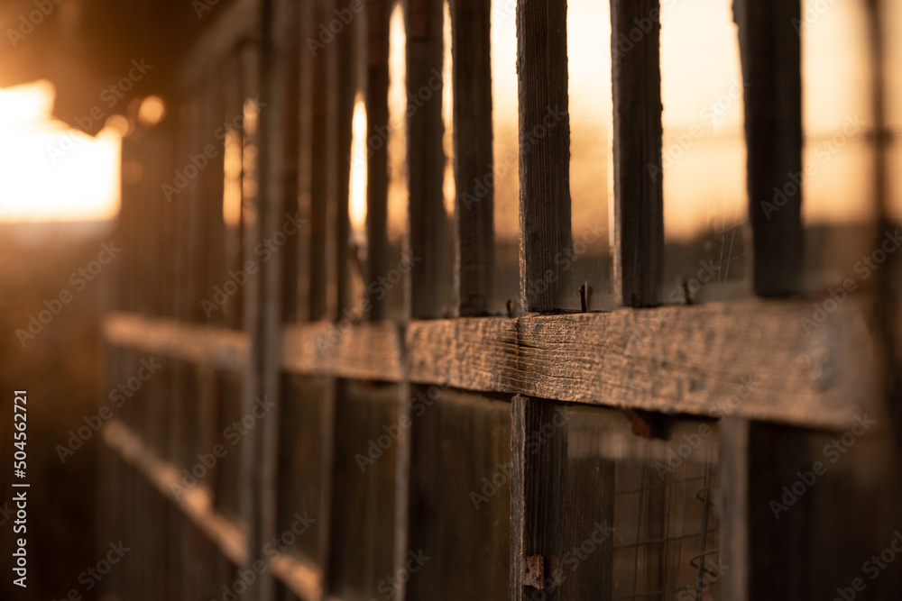 Window of an old house in sunset. Shallow depth of field. Window of an old house in sunset. Shallow depth of field.