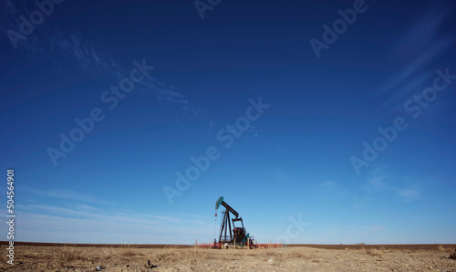 An oil pump jack on the prairies. photo