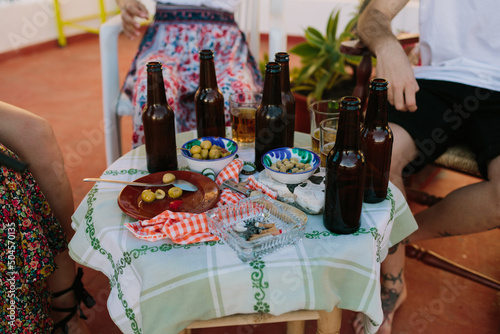 Table with andalusian tapas and beers photo