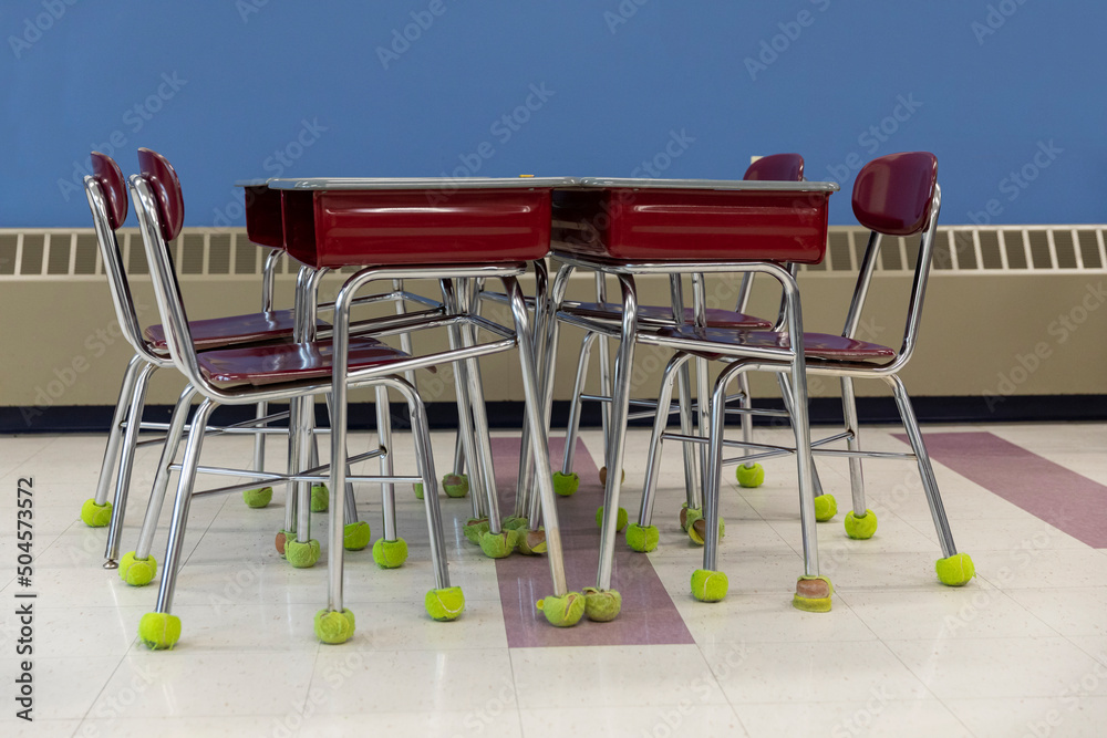 School Classroom Interior with Desk and Chairs with Tennis balls Stock