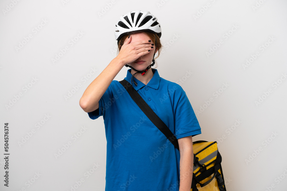 Young English woman with thermal backpack isolated on white background covering eyes by hands. Do not want to see something Young English woman with thermal backpack isolated on white background covering eyes by hands. Do not want to see something