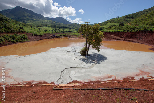 A tailings dam built to contain permanently byproducts of gold mining photo