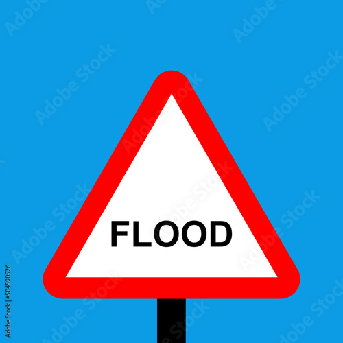 Warning triangle flood sign likely on this road