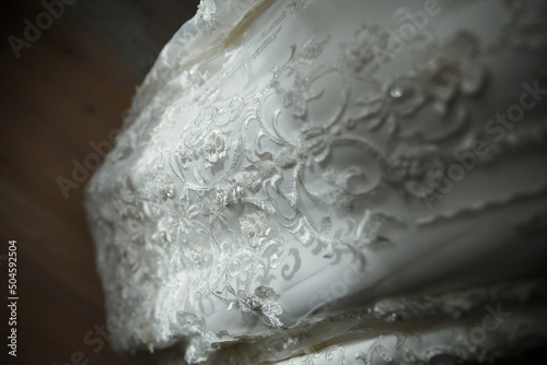 texture of the wedding dress of embroidered flowers
