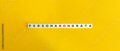 Persona Non Grata Banner. Letter Tiles on Yellow Background. Minimal Aesthetics. photo