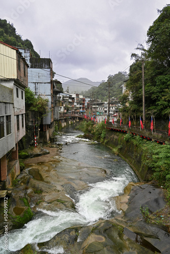 Shiding, Taiwn- December 20, 2020 - The famous Shiding old street at Shiding Village, 100 years more stone house with mountain river, New Taipei City, Taipei, Taiwan. photo