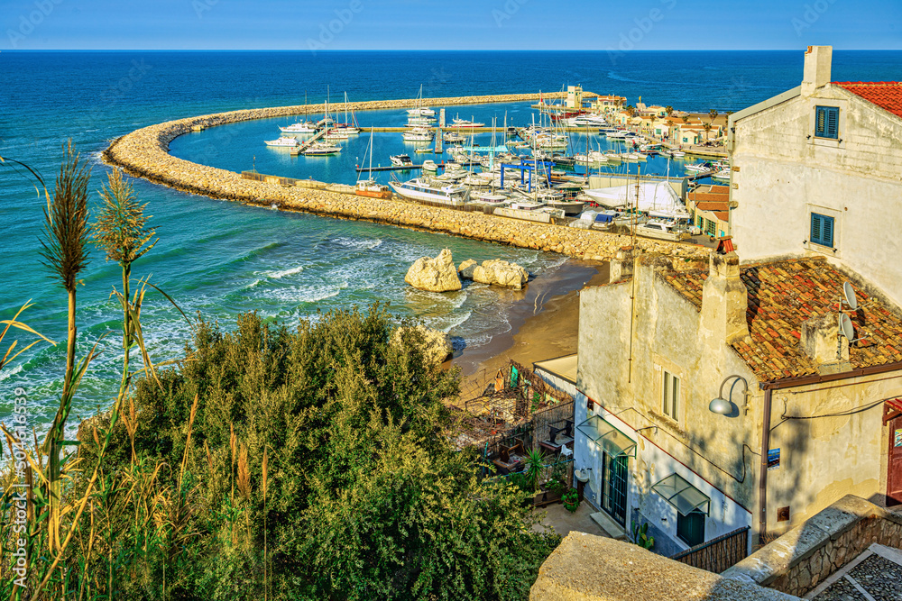 Naklejka premium Top view of the touristic port of Rodi Garganico and the beach. Rodi Garganico, Province of Foggia, Puglia, Italy, Europe
