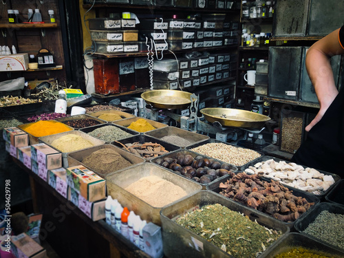 Herbal  and spice market stall at street market or basar (Suq Al Hamidiyah) in Damascus photo