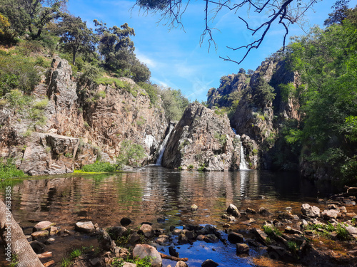 Waterfall. Cascada del Hervidero falling water on the Guadalix River located in the Community of Madrid  in Spain. Europe. Horizontal photography.