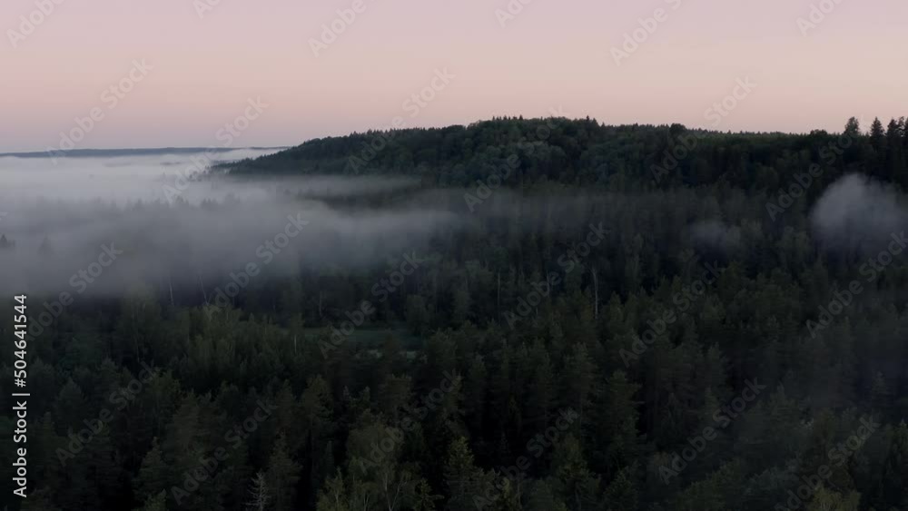 High flight over the thick summer morning fog. Aerial drone view. High flight over the thick summer morning fog. Aerial drone view.