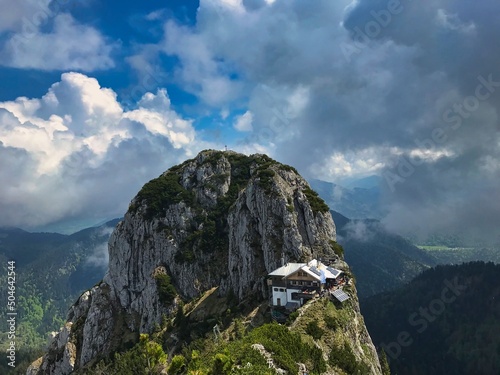 A cabin on the top of a mountain in the Bavarian Alps photo