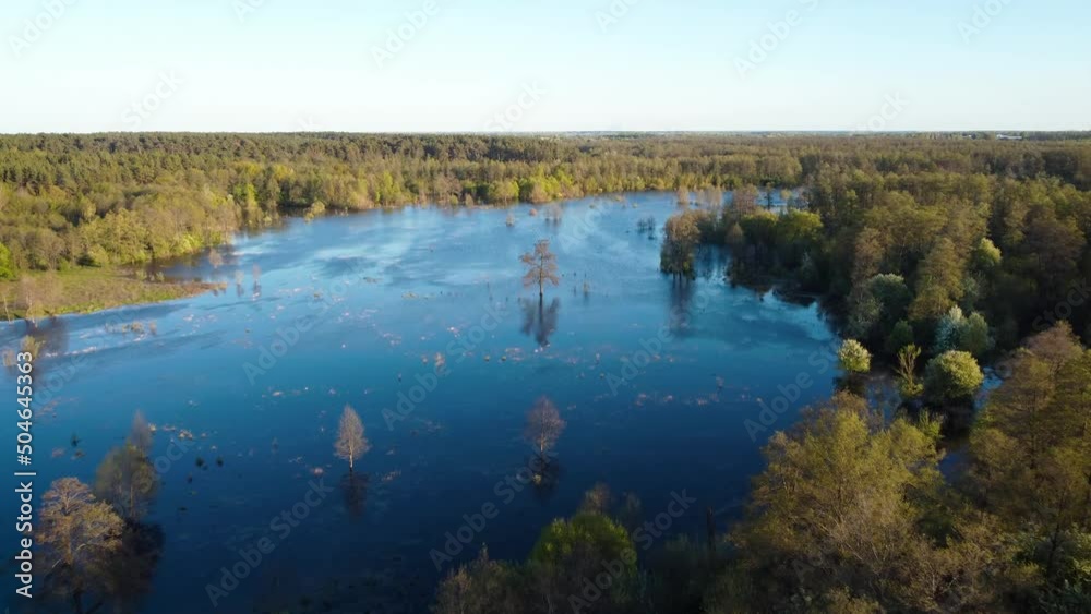 Valley of the river flooded during spring flood. Forests and fields in water Valley of the river flooded during spring flood. Forests and fields in water