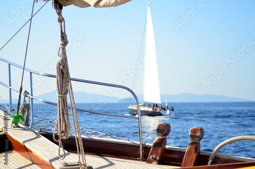 sailboat parts on sea with sunny day