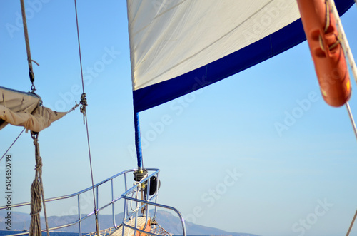 sailboat parts on sea with sunny day