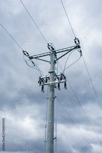 power pole against the sky, overhead line photo