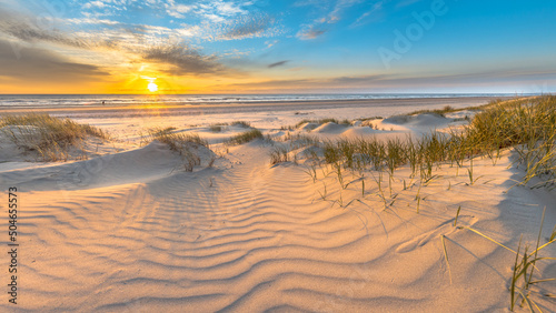 Fototapeta Naklejka Na Ścianę i Meble -  Beach and dunes colorful sunset