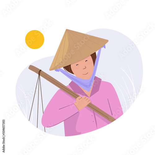 Vietnamese woman collects rice