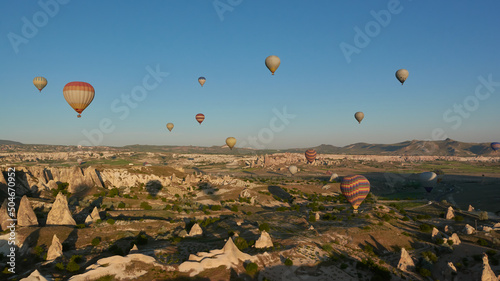Hot-air ballons flying above Cappadocia at dawn, Turkey © Olga