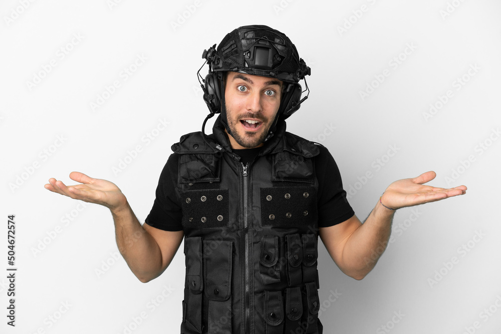 Young caucasian swat isolated on white background with shocked facial expression Young caucasian swat isolated on white background with shocked facial expression