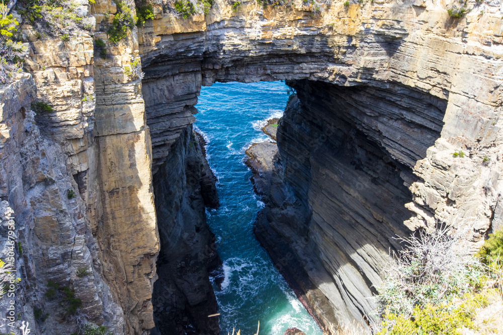 Natural Bridge called Tasmans Arch located in south West Tasmania Australia. Natural Bridge called Tasmans Arch located in south West Tasmania Australia.