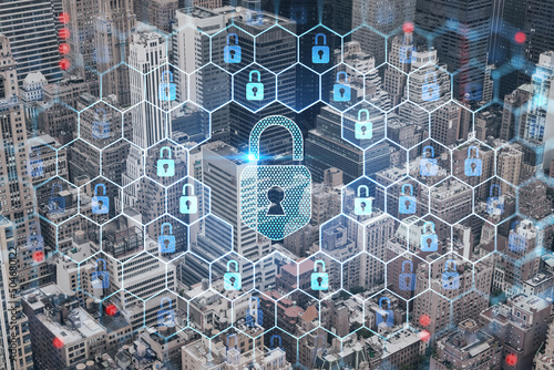 Aerial birds eye panoramic city view of Upper Manhattan area and East Side neighborhoods, New York city, USA. The concept of cyber security to protect confidential information, padlock hologram